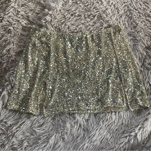 Revolve x East N West Mini Sequin Net Skirt in Gold